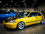 Yellow Honda Civic Hatchback at Tuner Evolution Chicago