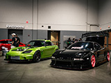 Green Honda S2000 and Black Acura NSX
