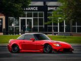 Bagged Red Honda S2000 outside of Boomers Stadium