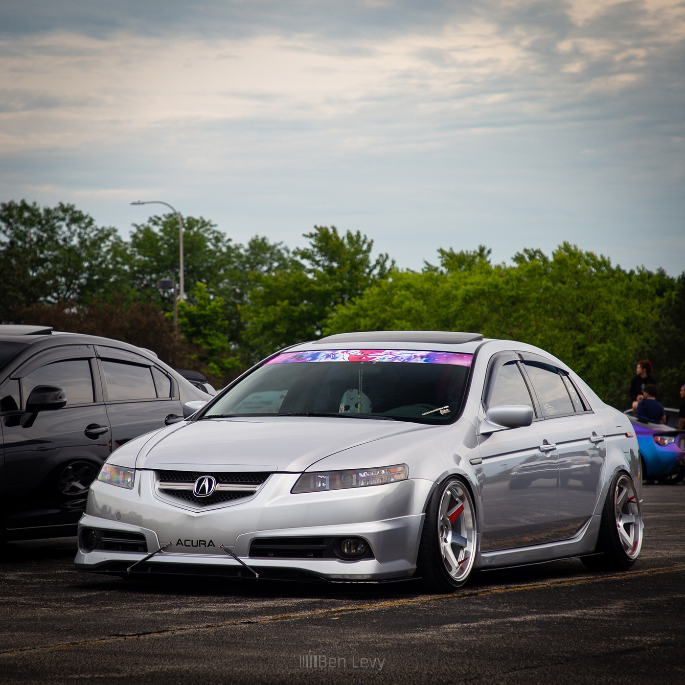 Silver Acura TL with Aggressive Stance