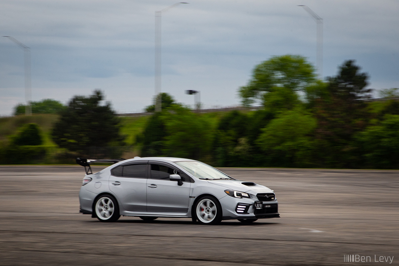 Silver Subaru WRX Driving