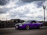Purple Skyline GT-R out on a Cloudy Day
