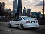 White Honda Civic Sedan and the Chicago Skyline