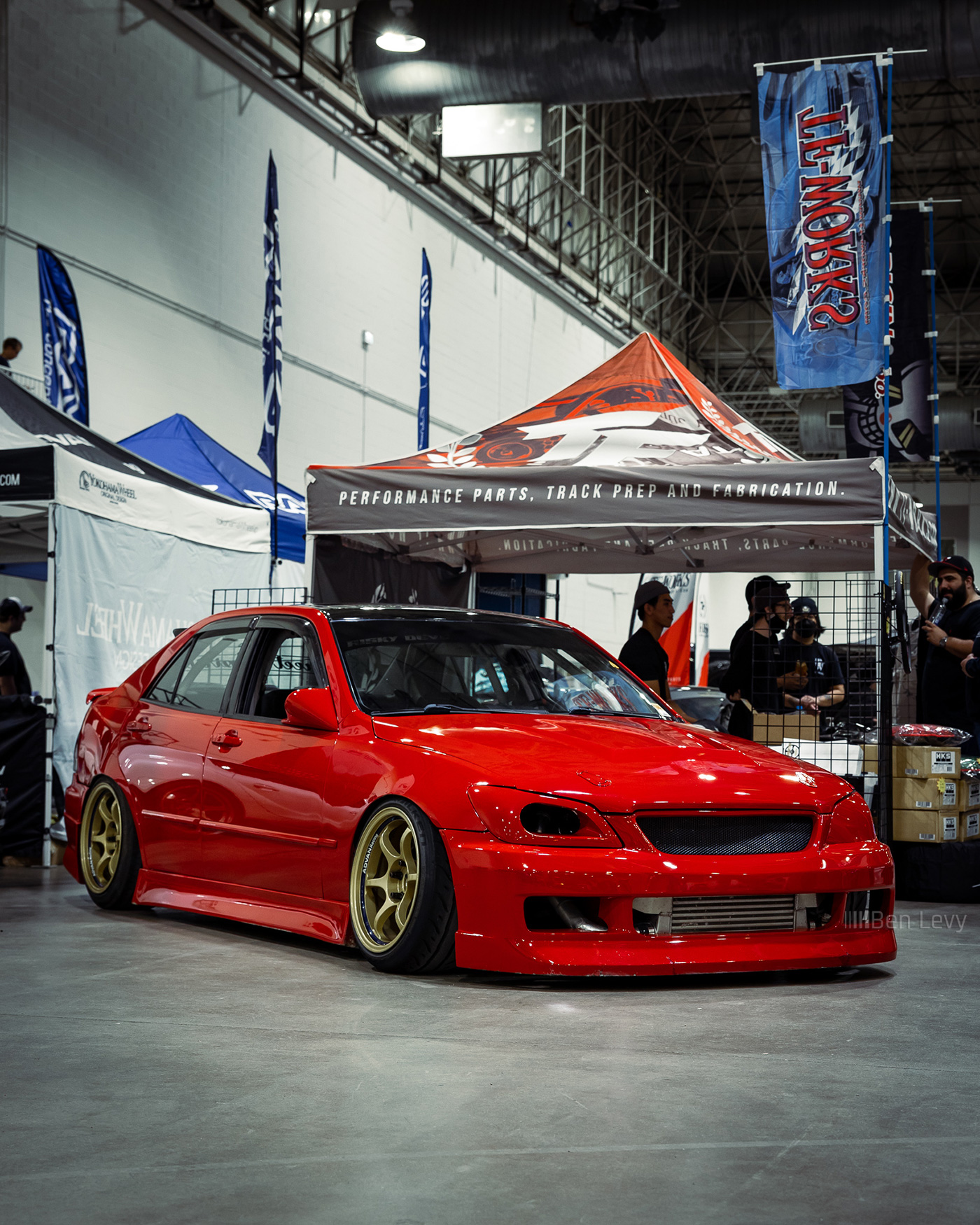 Red Lexus IS300 at TF Works booth at Wekfest
