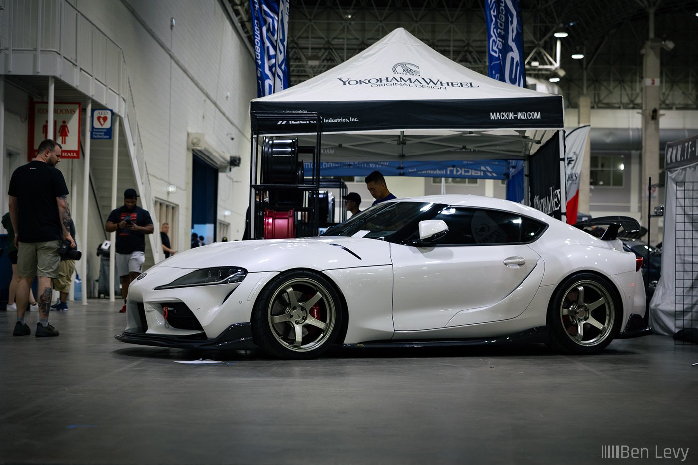 White A90 Toyota Supra at the Rays Engineering Booth