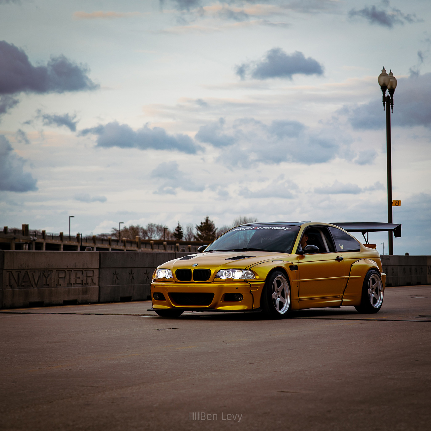 Golden BMW M3 on the street by Navy Pier in Chicago