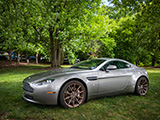 Silver Aston Martin Vantage in the Grass