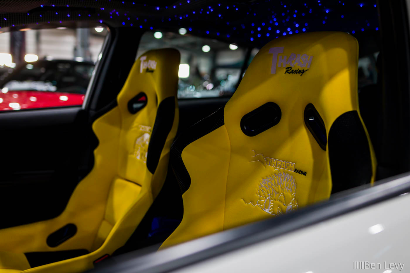 Yellow Thrash Racing Seats in Subaru WRX