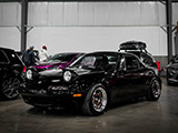 Black Mazda Miata at Cars and Culture Opener