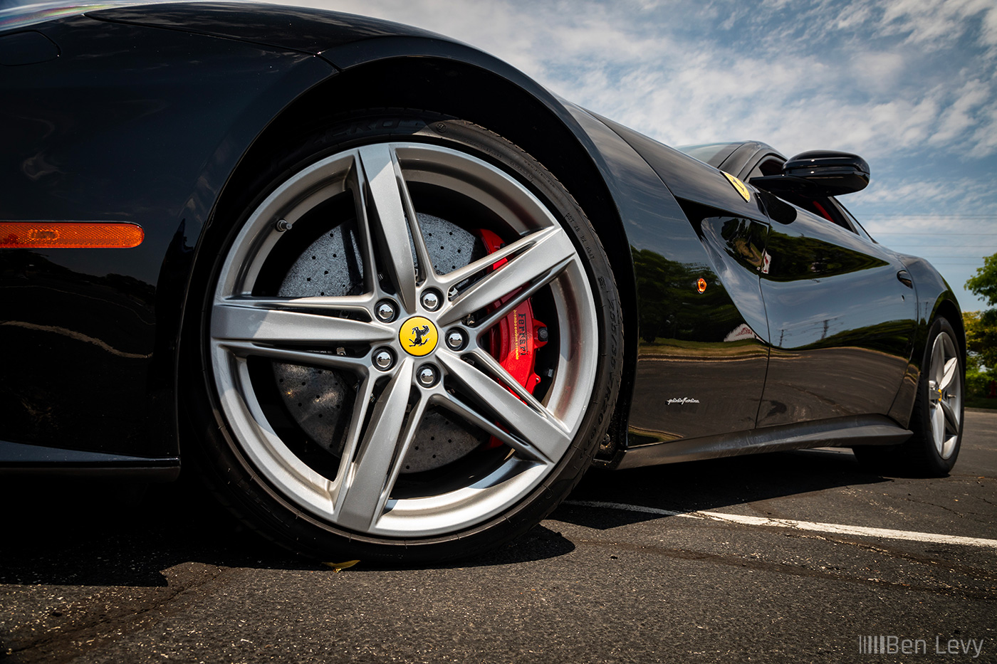 Front Wheel of Black Ferrari F12berlinetta