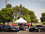 Black Lamborghini Aventador and Ferrari F12berlinetta