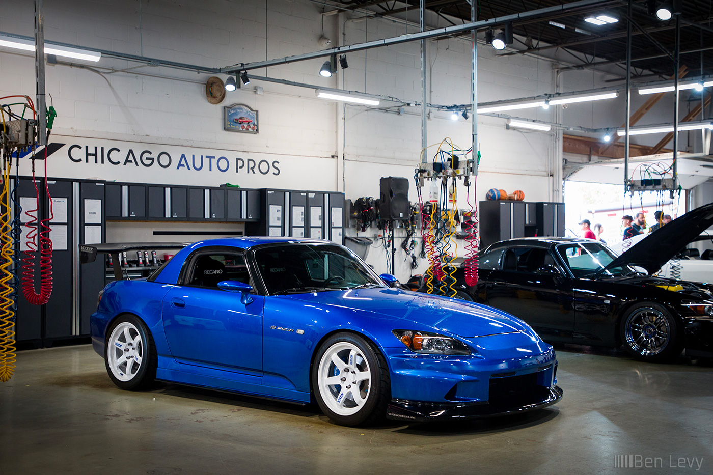 Clean Honda S2000 at a bay in Chicago Auto Pros Lombard