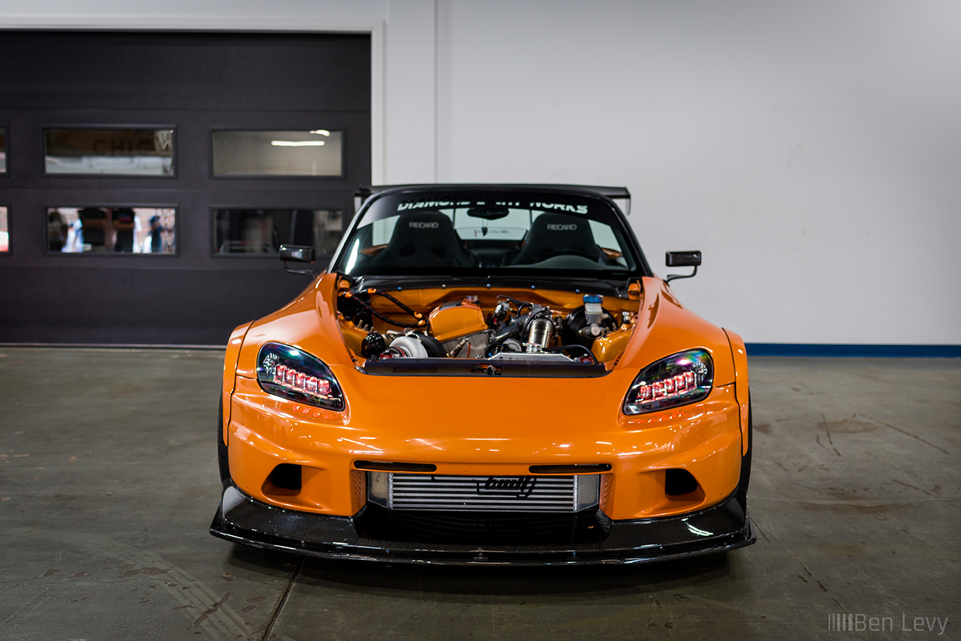 Front of Orange Honda S2000 at Chicago Auto Pros in Lombard