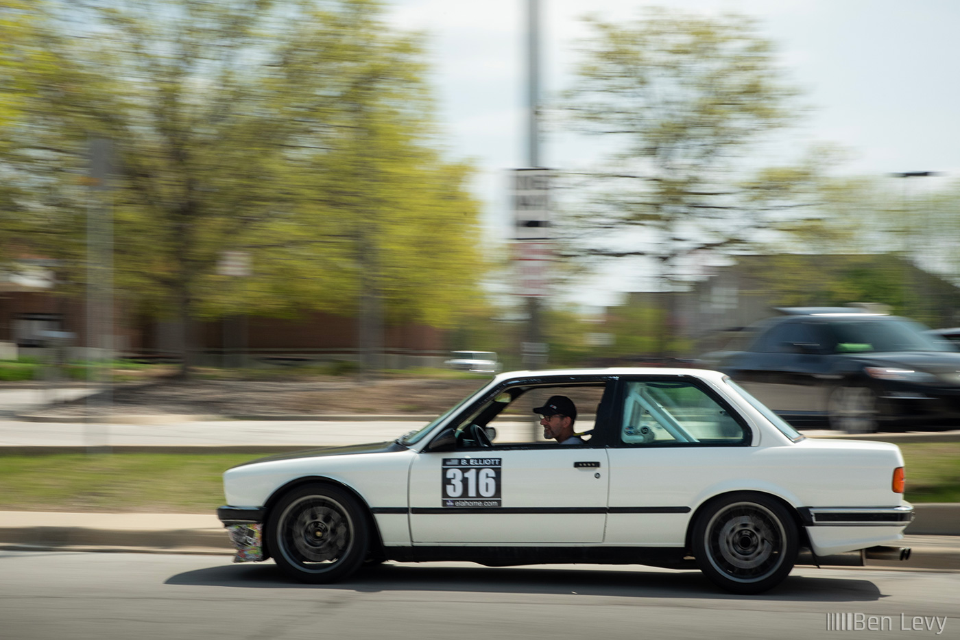 Rolling Shot of White E30 BMW Coupe