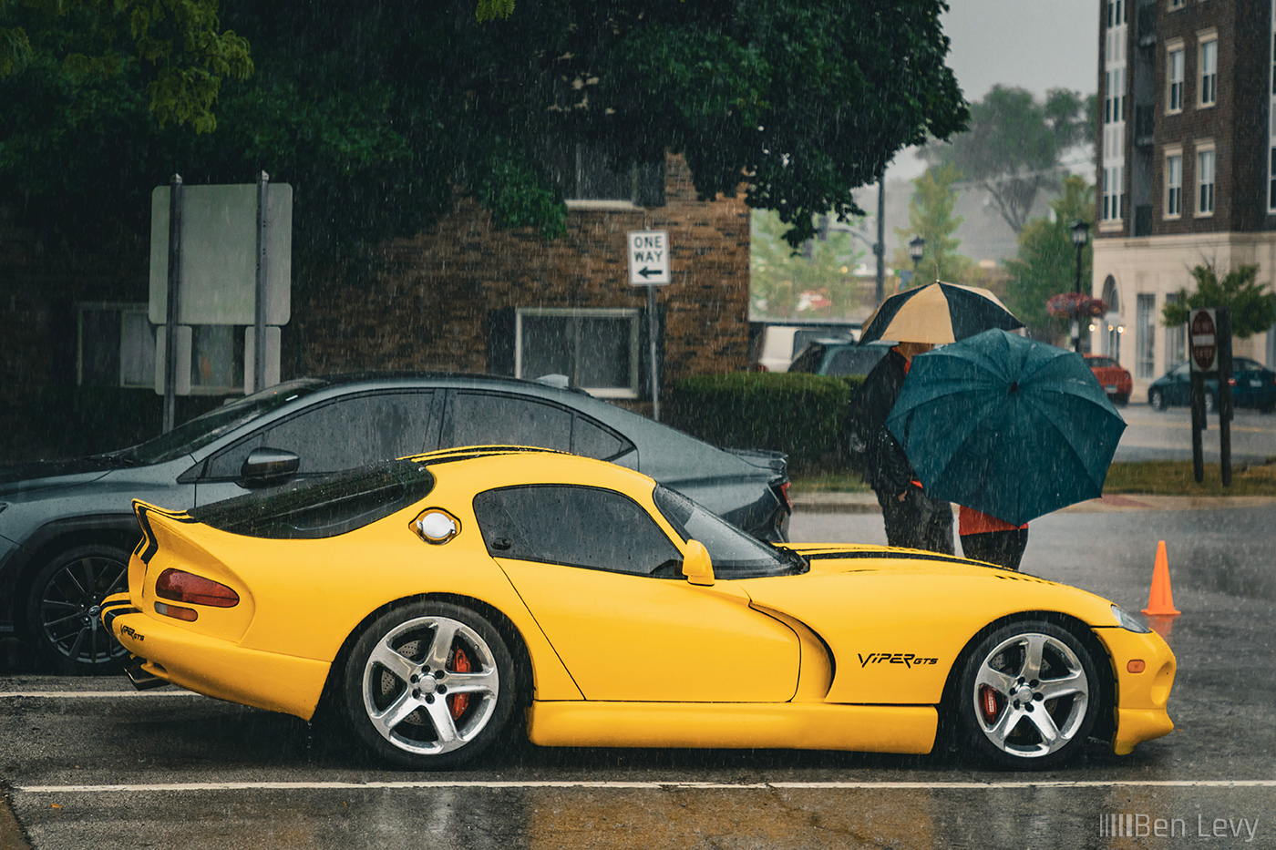 Side of Yellow Dodge Viper GTS in the Rain