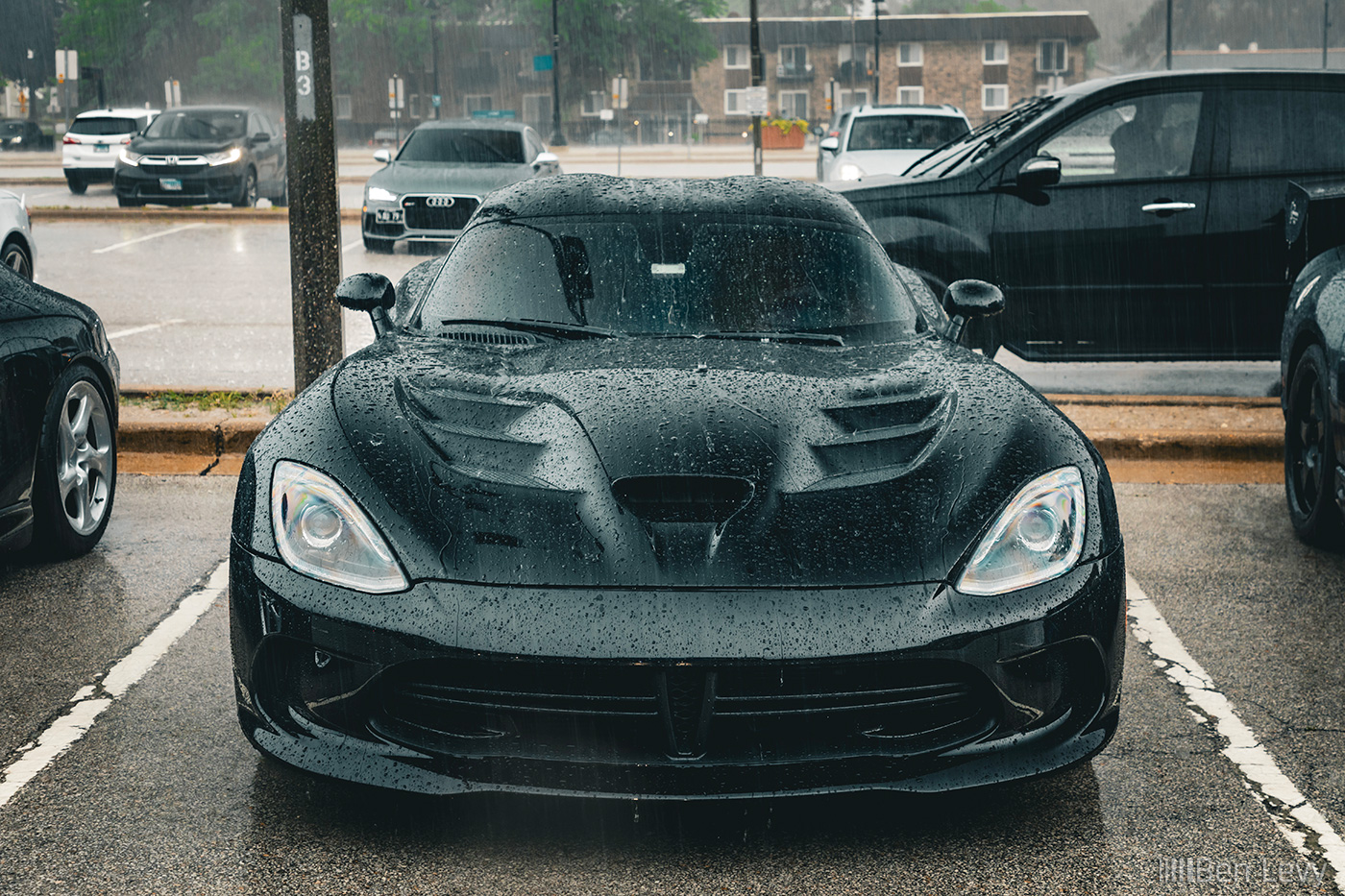 Front of Black Dodge Viper in the Rain