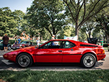 Side of Red BMW M1 at a car meet in the Chicago suburbs