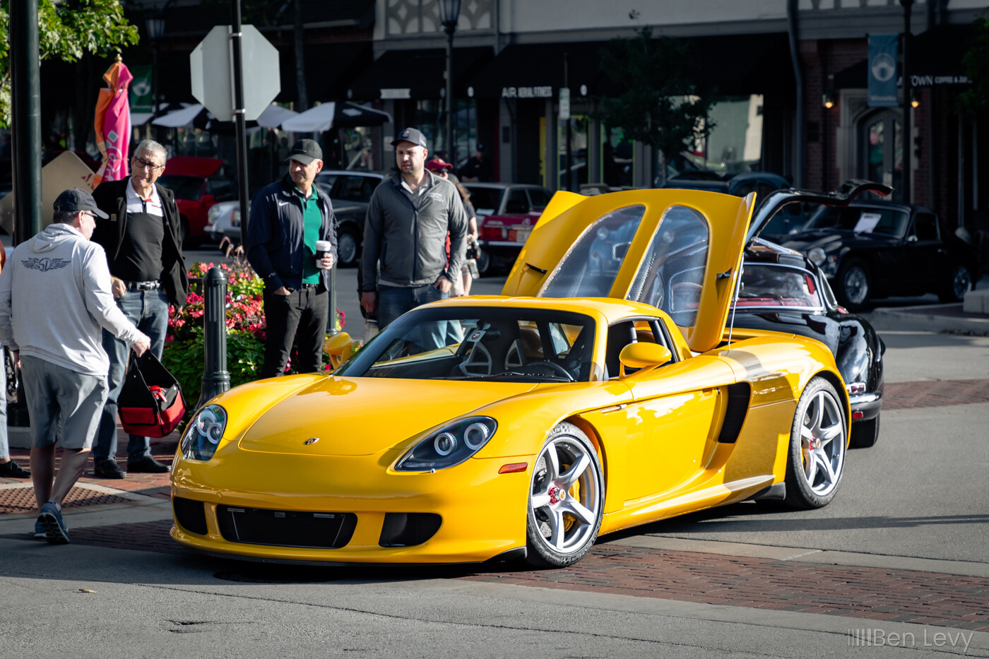 A Yellow Porsche Carrera GT on display at Fuelfed Coffee & Classics Winnetka