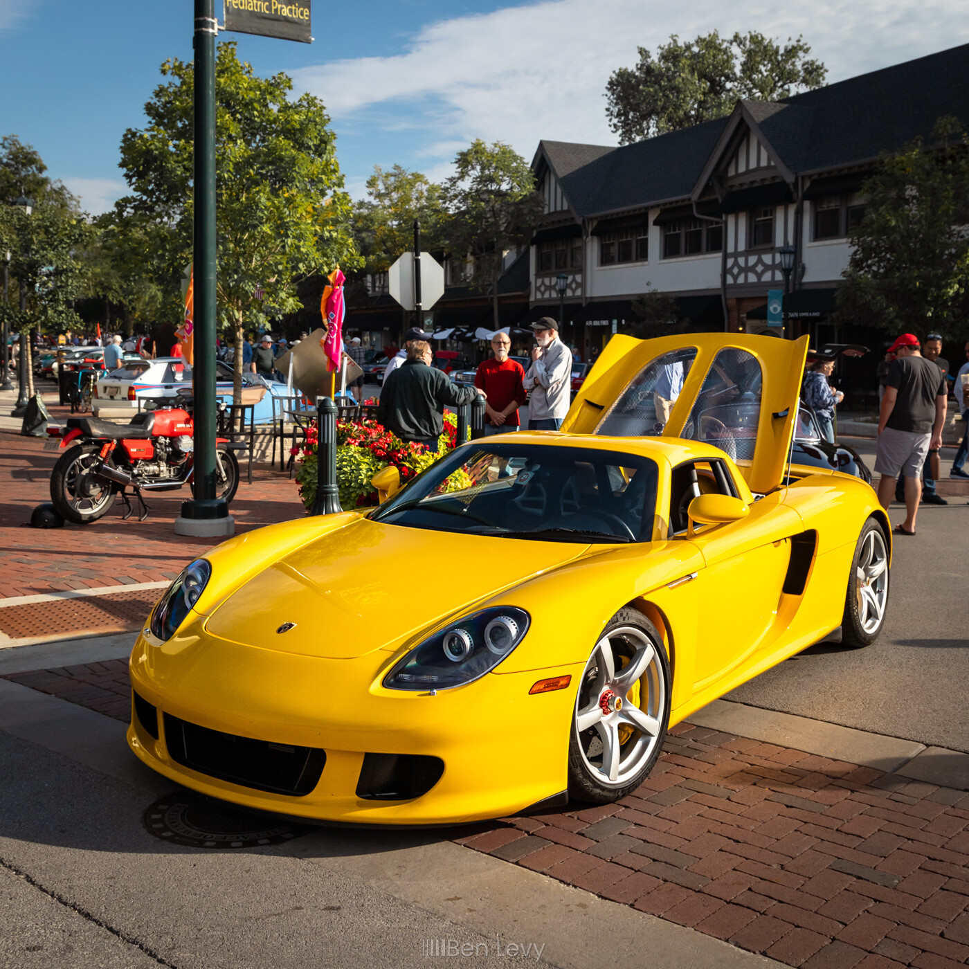 Yellow Porsche Carrera GT at a Cars & Coffee in Winnetka