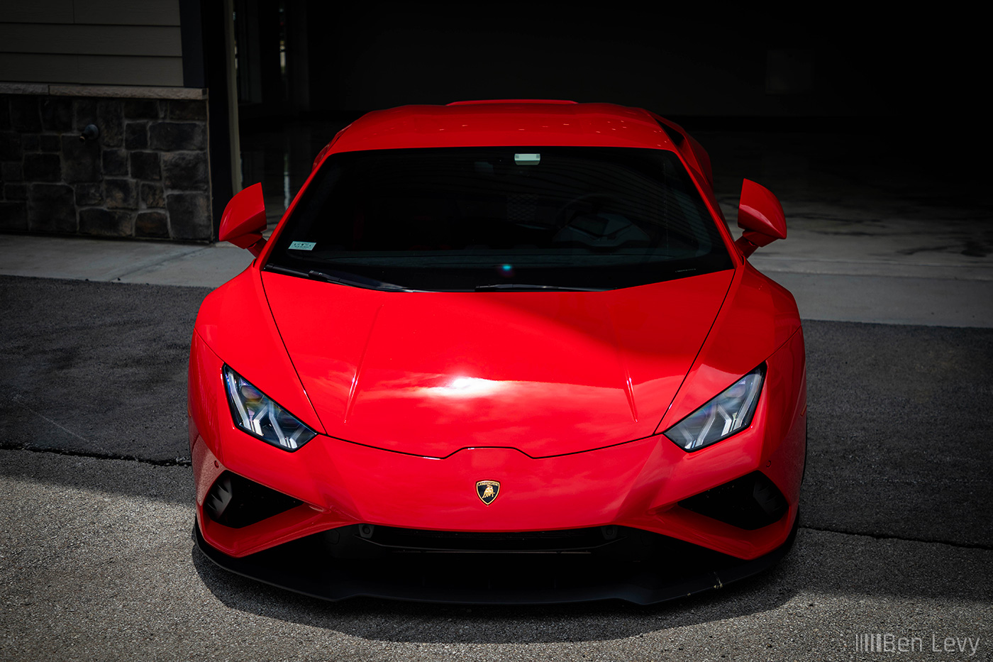 Front of Red Lamborghini Huracan at Iron Gate Motor Condos Car Show