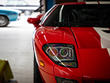 Right Headlight of Red Ford GT