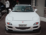 Front of White FD RX-7 at Iron Gate