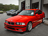 Red BMW 318is Coupe (E36)