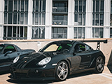 Black Porsche Cayman S with Big Spoiler
