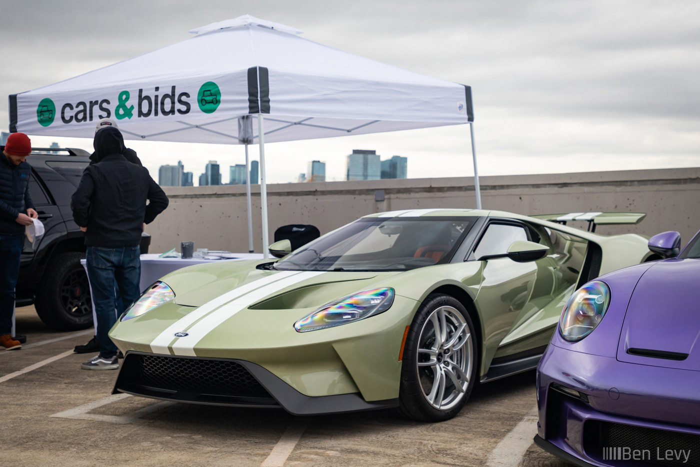 Green Ford GT at the Cars & Bids Booth