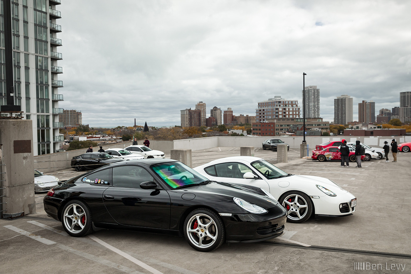 Black Porsche 911 and White Boxtser in a Chicago Garage