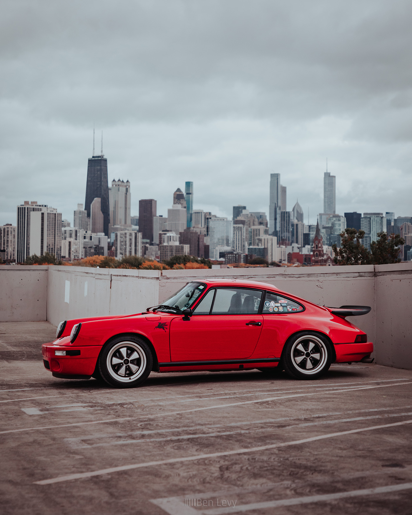 Side of Red Porsche 911 Against The Chicago Skyline