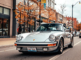 Silver Porsche 911 on Lincoln Ave in Chicago