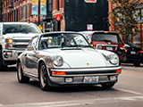 Silver Porsche 911 on the street in Lincoln Park