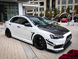 White Lancer Evolution X with Black Enkei RPF1 Wheels