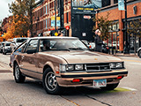 Beige 1st Gen Toyota Supra in Lincoln Park