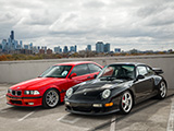 Red E36 Coupe and Black 993 C4S