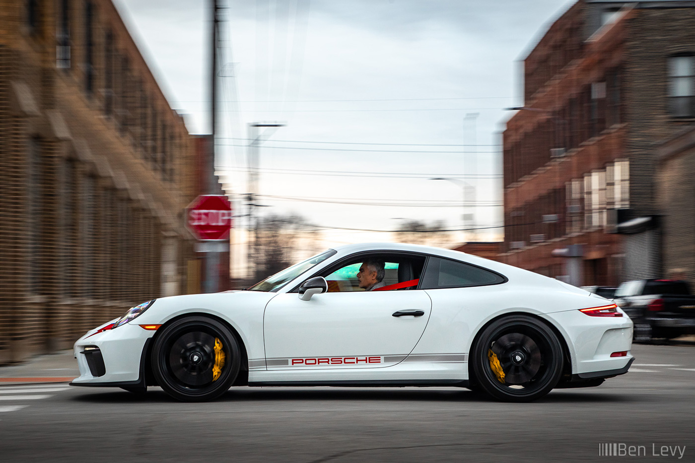 White Porsche 991 GT3 Touring Rolling on a street in Chicago