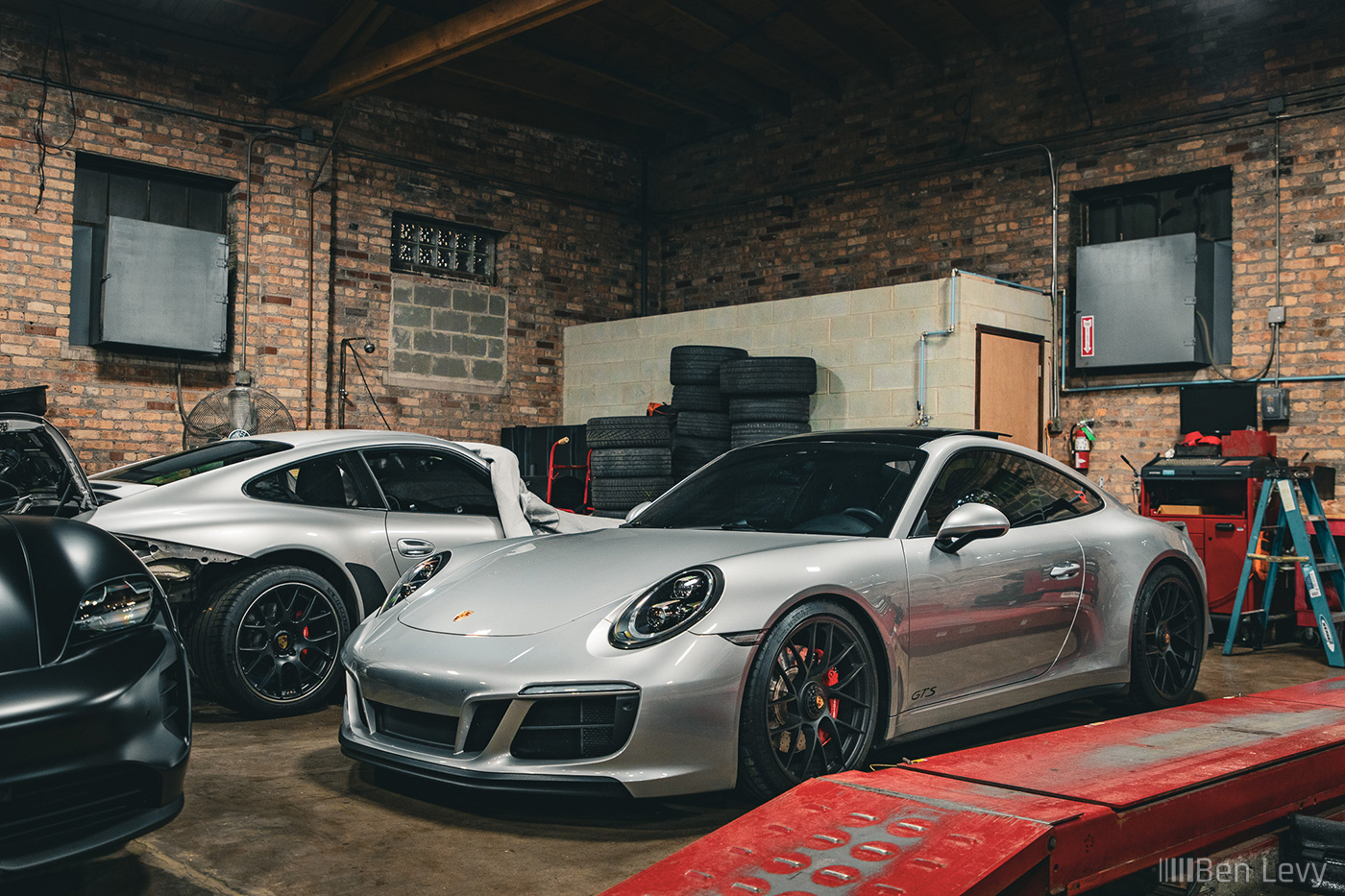 Silver Porsche 911 GTS Tucked away at Midwest Performance Cars