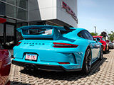 Miami Blue Porsche 911 GT3 outside of Napleton Porsche Westmont