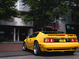 Yellow Lotus Espirit leaving Cars & Coffee Oak Park