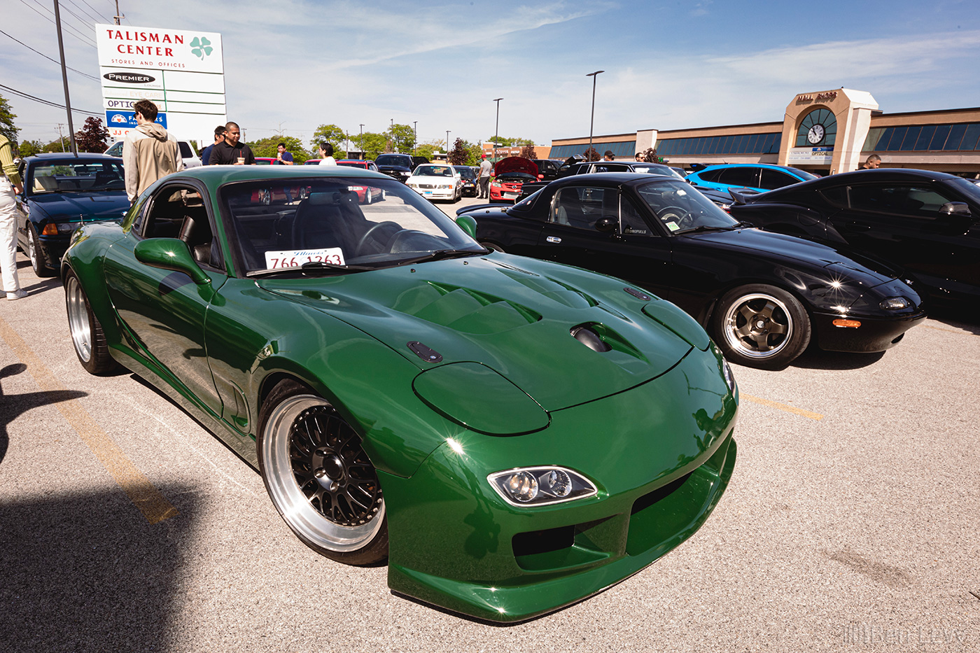 Green, Widebody Mazda RX-7 at Cars & Coffee in Gleview, IL