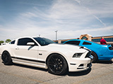 White Ford Mustang with Black Stripes