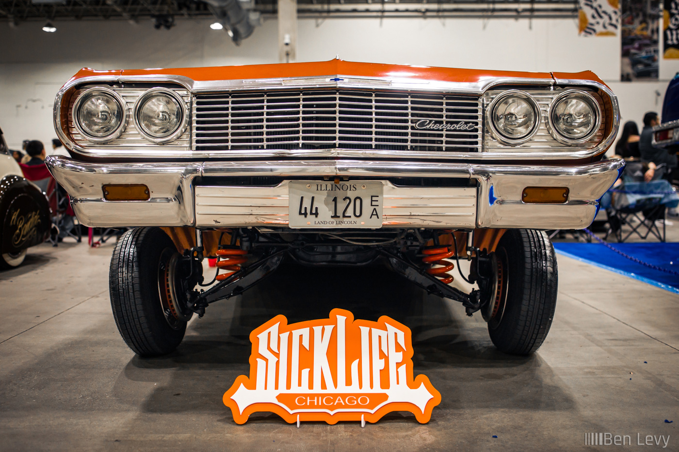 Front of Orange Impala From SickLife Car Club