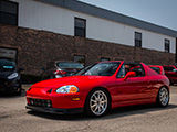 Red Honda del Sol at the Sound Performance Open House