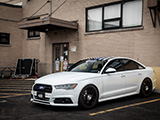 White Audi S6 looking like a Ford Taurus