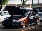 Black BMW 540i M Sport at Cars and Coffee