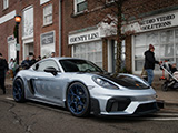 Silver Porsche 718 Cayman GT4 RS at Toy Drive in Hinsdale