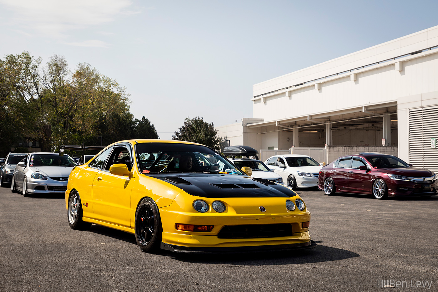 Yellow Acura Integra Waiting to Get Into Car Show