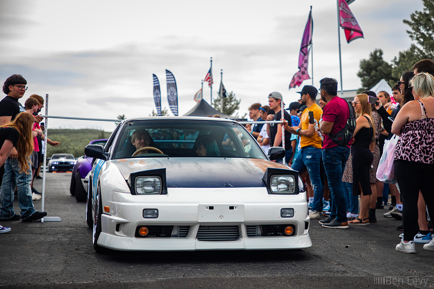 Mike Prizza doing low car limbo in his white S13