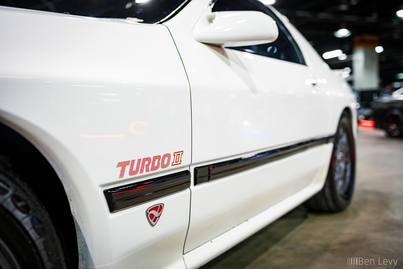 Red Turbo II Sticker on the Side of Mazda RX-7